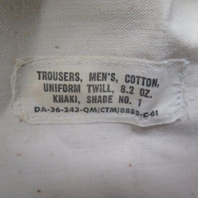 Information on left pocket of pants: Origsize: 13" (w) x 40" (l) wh; Origformat: Artifact