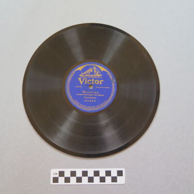 A side of record.: Origsize: 9.75" (diam); Origformat: Artifact