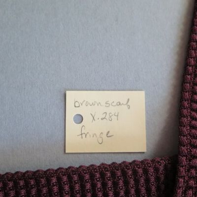 Number of scarf: Origsize: 11" (w) x 43" (l); Origformat: Artifact