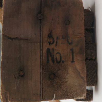 Text on crate: Origsize: 5.25" (h) x 40" (l); Origformat: Artifact