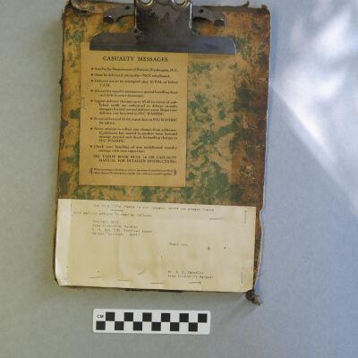 Front of clipboard.: Origsize: 8" (w) x 13" (l) x 2; Origformat: Artifact