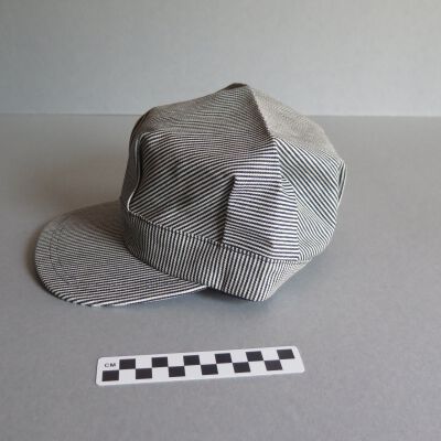 Side of hat.: Origsize: 5" (h) x 9.5" (w) x; Origformat: Artifact