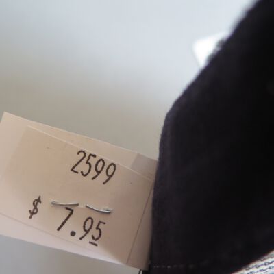 Back of tag in hat.: Origsize: 5" (h) x 9.5" (w) x; Origformat: Artifact