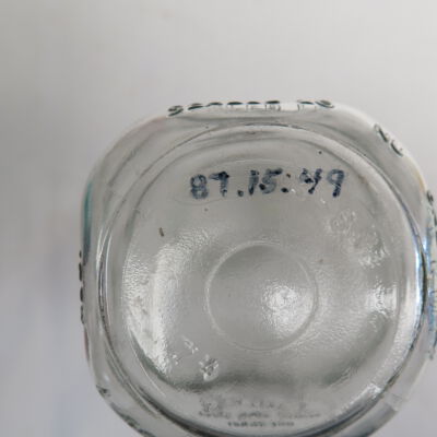 Number on bottom of milk bottle.: Origsize: 8.75" (h) x 3.25" (d; Origformat: Artifact