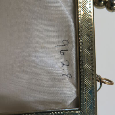 Number detail inside purse: Origsize: 5.75" (h) x 7" (w) x; Origformat: Artifact