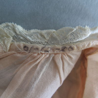 Close up of historic number on dress.: Origsize: 14" (w) x 10" (l); Origformat: Artifact