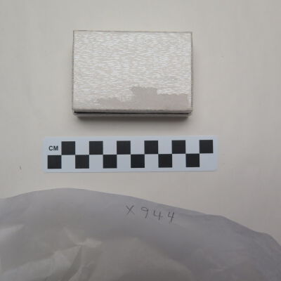 Bottom of box.: Origsize: 1" (h) x 3" (w) x 2"; Origformat: Artifact
