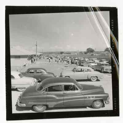 People visiting the grand opening of a new housing development