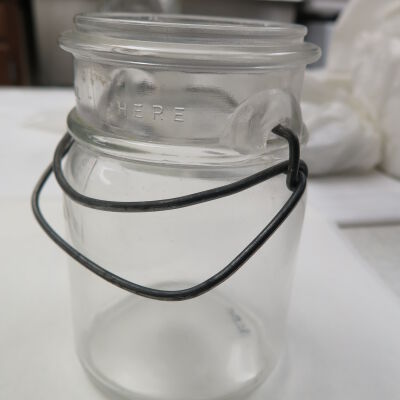 Side of jar with wire: Origsize: 5" (h) x 3" (dia); Origformat: Artifact