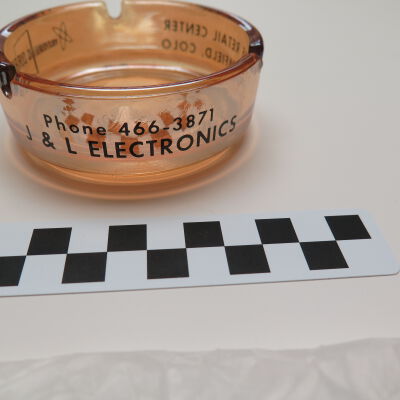 Side of ashtray: Origsize: 1.25"(H) x 3.5"(W); Origformat: Artifact