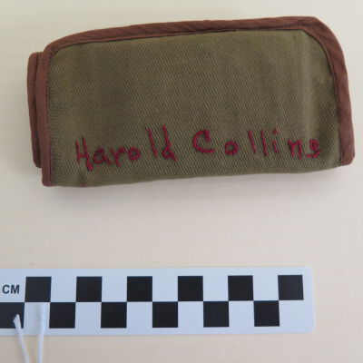 Front of sewing kit: Origsize: 1" (h) x 2.5" (w) x; Origformat: Artifact
