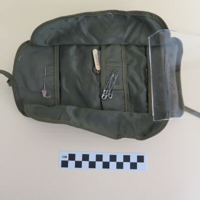 Inside of sewing kit: Origsize: 1.25" (h) x 3.25" (w; Origformat: Artifact