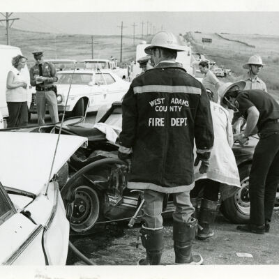 West Adams County firefighter at a car accident at Highway 287