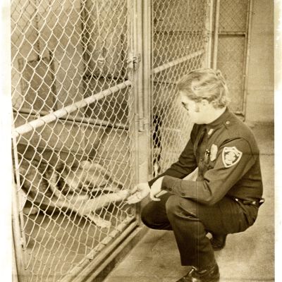 "New Facility" Dog pound? K-9? Policeman and dog