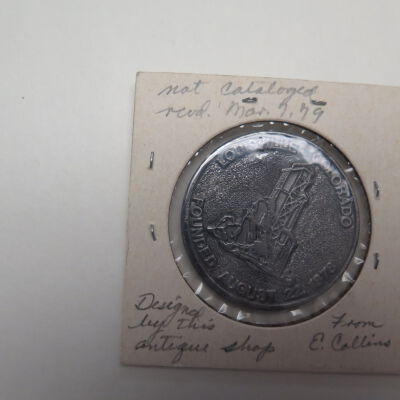 Back of coin: Origsize: 2.5" (w) x 2.5" (l); Origformat: Artifact