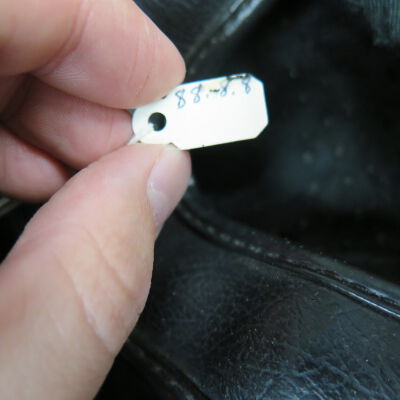 Tag on helmet.: Origsize: 7" (h) x 9" (w) x 11; Origformat: Artifact
