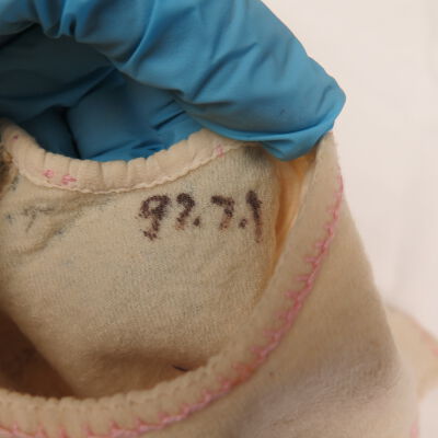 Number on dress.: Origsize: 7" (w) x 15" (l); Origformat: Artifact