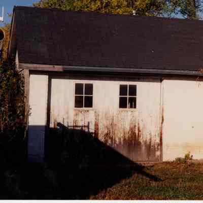 Unidentified white garage or outbuilding