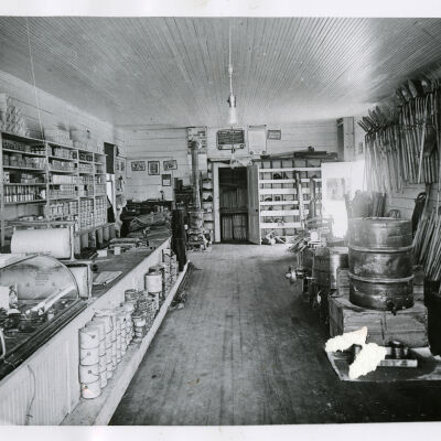 Proprietor Roy Reese Inside Hogsett Lumber and Mercantile Company