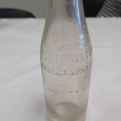 Close up of text on bottle.: Origsize: 8.25" (h) x 2.25" (d; Origformat: Artifact