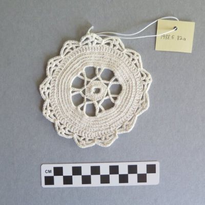 Doily and number of doily.: Origsize: 4.25" (diam); Origformat: Artifact