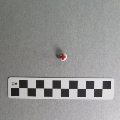 Front of Red Cross pin.: Origsize: 0.75" (diam); Origformat: Artifact