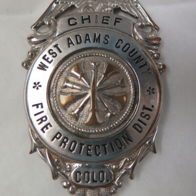 Milton Mulligan's West Adams County Fire Protection District Chief's Badge