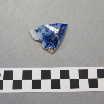 Back of fragment.: Origsize: .25" (h) x 1.75" (w); Origformat: Artifact