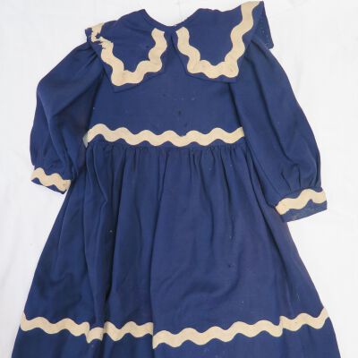 One side of dress.: Origsize: 23" (l) x 18 " (w); Origformat: Artifact