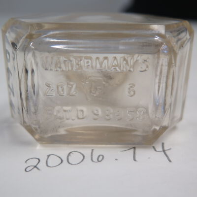 Bottom of ink bottle.: Origsize: 2.25" (h) x 1.5" (w); Origformat: Artifact