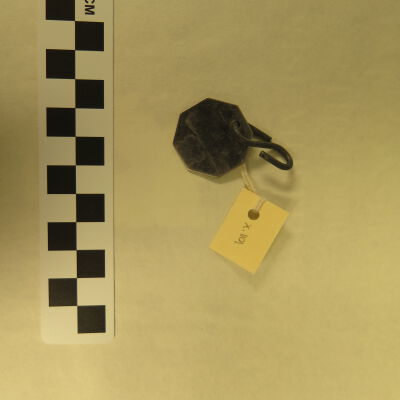 Back of tag.: Origsize: 1" (w) x 1" (l); Origformat: Artifact