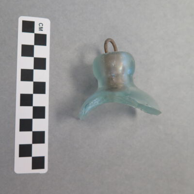 Other side of bottle fragment.: Origsize: 3" (h) x 2.5" (w) x; Origformat: Artifact