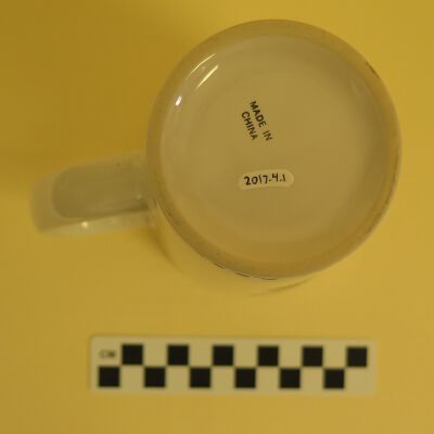 Bottom of mug.: Origsize: 6" (h) x 5" (w)