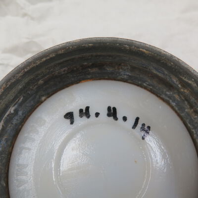 Number on bottom of jar lid: Origsize: 1" (h) x 3" (dia); Origformat: Artifact