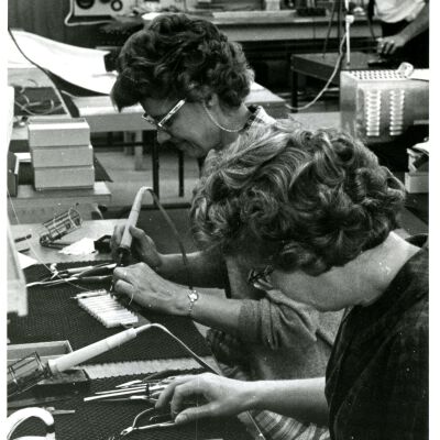 Two Women Working
