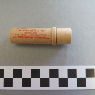 Continued text on side of case.: Origsize: 2.5" (h) x 0.75" (di; Origformat: Artifact