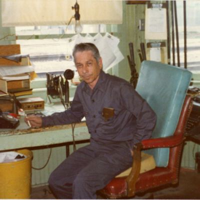 Station agent Herb Rutledge at the Broomfield depot, circa 1975: Origsize: 3.5" x 4.5"; Origformat: Print-Photographic; Resolution: 1200dpi