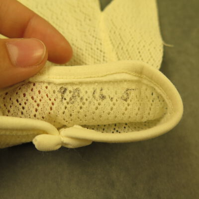 Close up of number on gloves.: Origsize: 3.5" (w) x 8" (l); Origformat: Artifact
