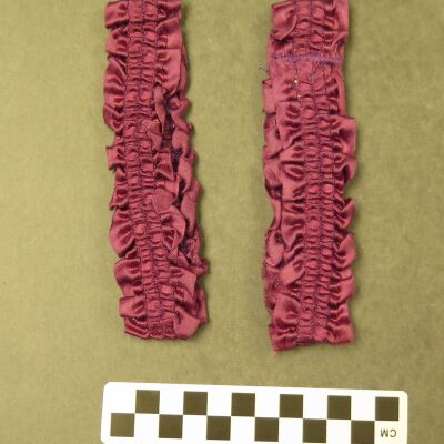 Other side of garters.: Origsize: 2" (w) x 6" (l); Origformat: Artifact