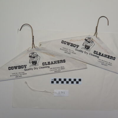 Front of hangers.: Origsize: 8.5" (h) x 16.5" (l); Origformat: Artifact