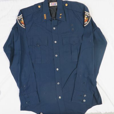 Front of shirt.: Origsize: 17" (w) x 32" (l); Origformat: Artifact