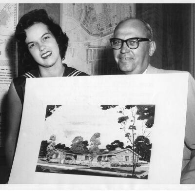 Marianne MacDonald and Pete DeLongchamps with Home Rendering