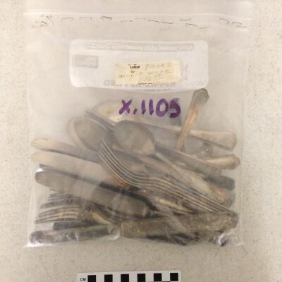 Front of bag containing flatware.: Origformat: Artifact