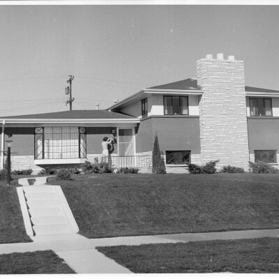 New Tri-level Home with Woman