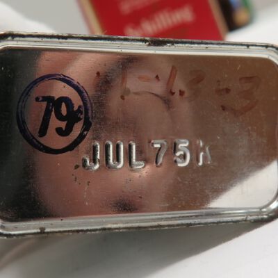 Bottom of tin: Origsize: 2.75" (h) x 1.25" (w; Origformat: Artifact