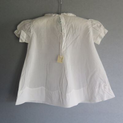 Back of dress: Origsize: 8" (w) x 13" (l); Origformat: Artifact
