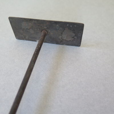 Close up of end of stove tool.: Origsize: 30" (h) x 3" (w) x 1; Origformat: Artifact