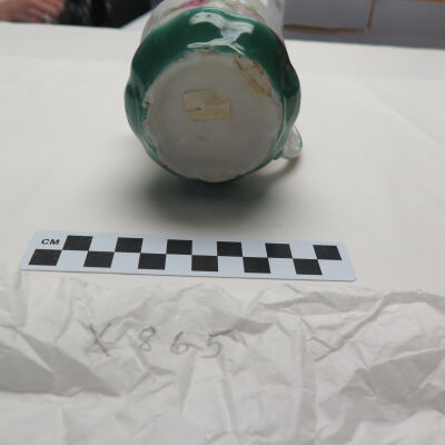 Bottom of teacup.: Origsize: 3" (h) x 4" (w); Origformat: Artifact