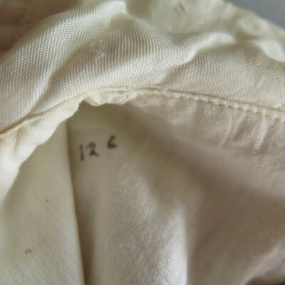 Number of coat: Origsize: 17" (w) x 22" (l); Origformat: Artifact