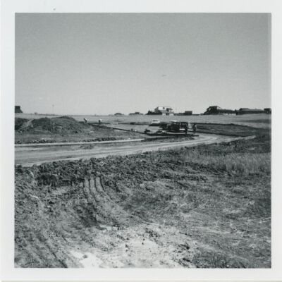 Parked cars by road near relocation site for Broomfield train depot, 1976: Origsize: 3.5" x 3.5"; Origformat: Print-Photographic; Resolution: 1500dpi